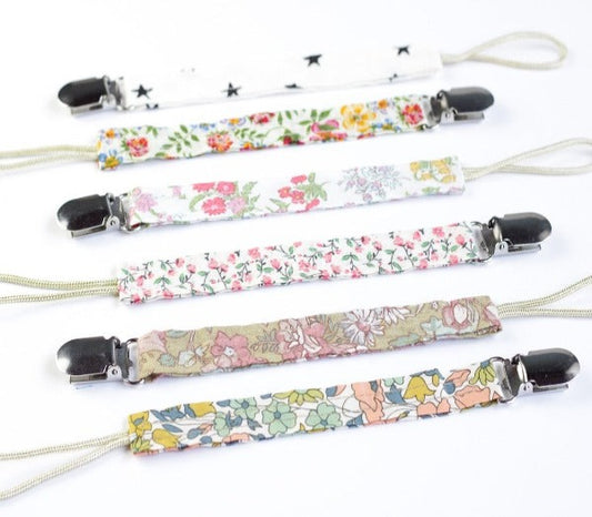 Cozy Charm: Cloth Pacifier Holders for Sweet and Practical Baby Comfort