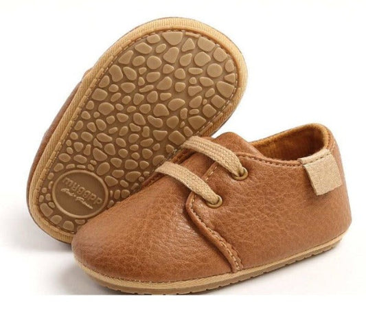 Brown: Baby Boy Leather Shoes with Non-Slip Rubber Sole for Stylish Comfort